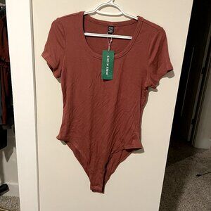 NWT Rust-colored Bodysuit